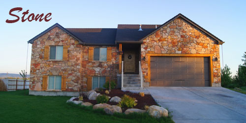 family style house with a stone exterior.